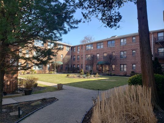 Backyard, Exterior, Facade, Brick Facade, Condo Building