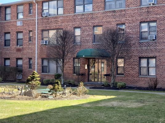 Exterior, Facade, Brick Facade, Condo Building