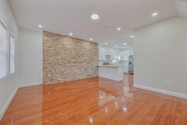 Empty room, Interior, Kitchen, Recessed Lighting, Stone Walls, Wood Texture Flooring