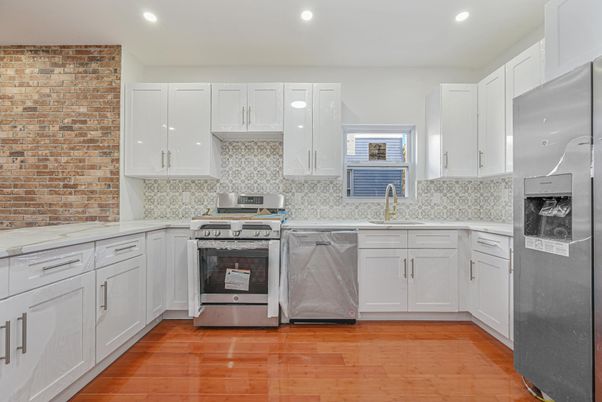 Interior, Kitchen, Recessed Lighting, Stainless Steel Appliances, Stone Walls, Wood Texture Flooring