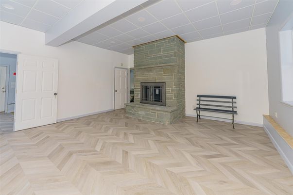 Empty room, Fireplace, Interior, Recessed Lighting, Wood Texture Flooring