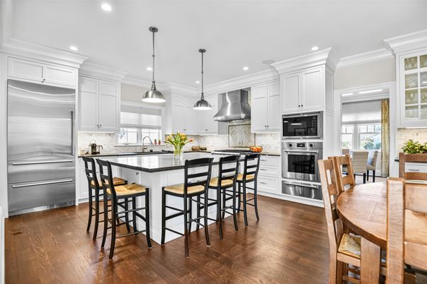 Dining room, Interior, Kitchen, Pendant Lights, Recessed Lighting, Stainless Steel Appliances, Wood Texture Flooring