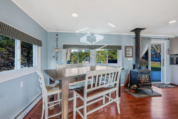 Dining room, Fireplace, Interior, Pendant Lights, Recessed Lighting, Wood Texture Flooring