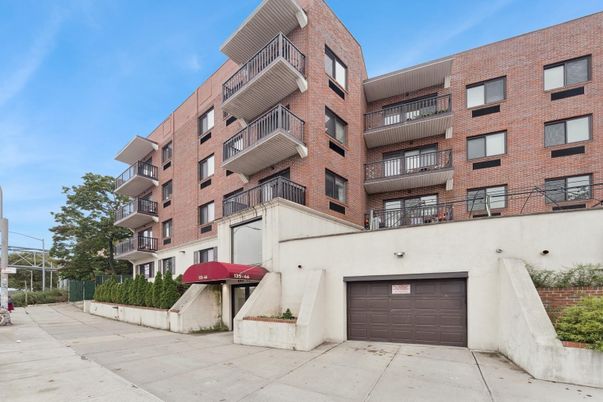 Attached, Exterior, Facade, Brick Facade, Condo Building