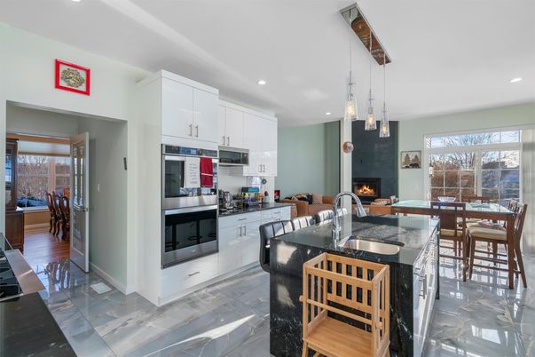 Dining room, Fireplace, Interior, Kitchen, Pendant Lights, Recessed Lighting, Stainless Steel Appliances