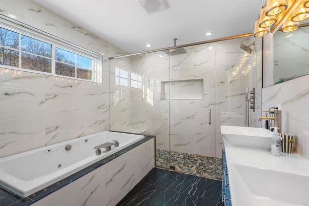 Bathroom, Dual Sink Vanities, Free Standing Baths, Glass Shower, Interior, Marble, Marble Walls, Recessed Lighting