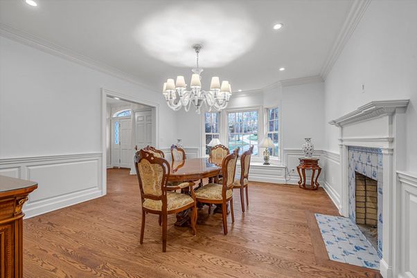 Chandelier, Dining room, Fireplace, Interior, Recessed Lighting, Wood Texture Flooring