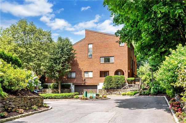 Exterior, Facade, Brick Facade, Condo Building