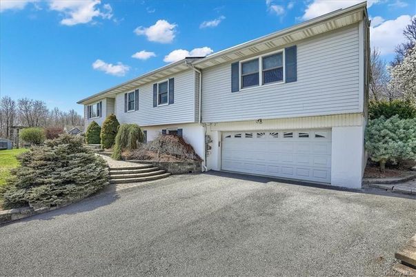Attached, Exterior, Facade, Raised Ranch