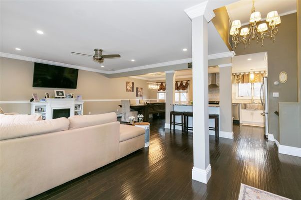 Chandelier, Dining room, Interior, Living room, Piano, Recessed Lighting, Wood Texture Flooring