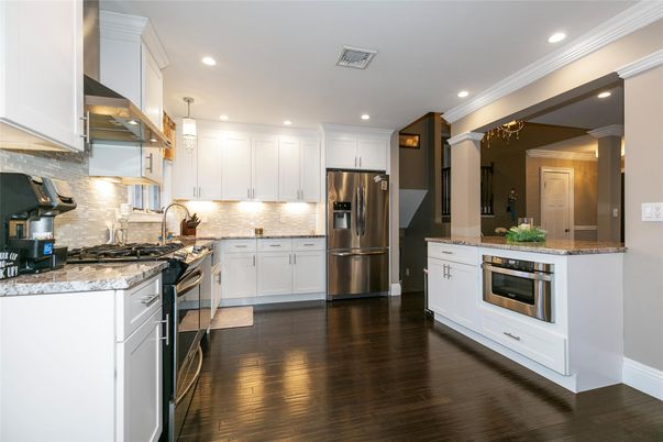 Interior, Kitchen, Pendant Lights, Recessed Lighting, Stainless Steel Appliances, Wood Texture Flooring