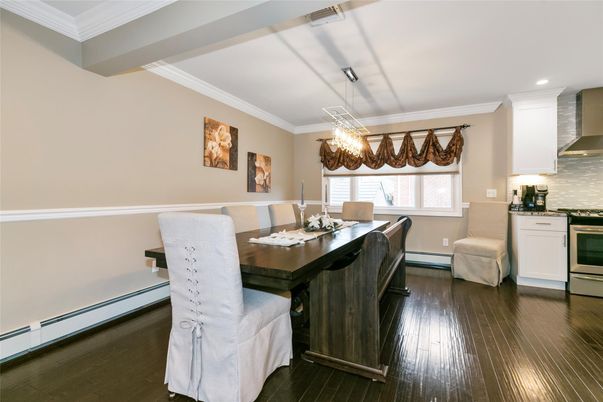 Chandelier, Dining room, Interior, Kitchen, Recessed Lighting, Stainless Steel Appliances, Wood Texture Flooring
