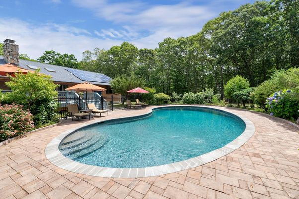 Exterior, Pool, Solar Panels