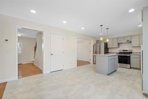 Interior, Kitchen, Pendant Lights, Recessed Lighting, Stainless Steel Appliances, Wood Texture Flooring