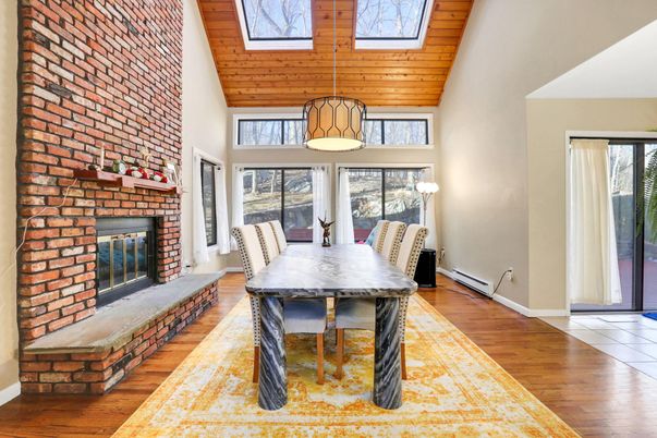 Dining room, Fireplace, Interior, Pendant Lights, Stone Walls, Wooden Ceilings, Wood Texture Flooring