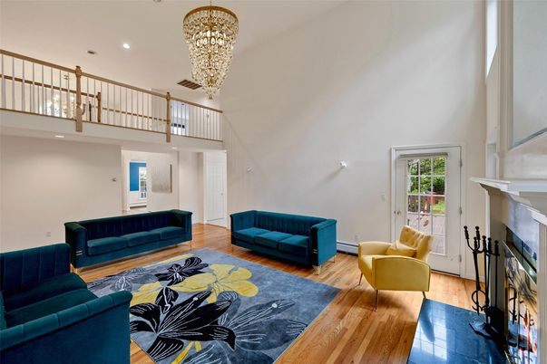 Chandelier, Fireplace, Interior, Living room, Recessed Lighting, Wood Texture Flooring