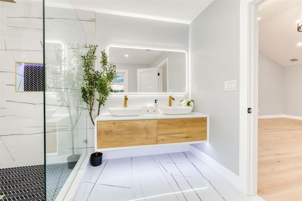 Bathroom, Dual Sink Vanities, Glass Shower, Interior, Recessed Lighting, Tile Countertops, Wood Texture Flooring