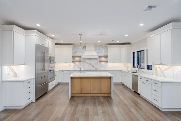 Interior, Kitchen, Marble Walls, Pendant Lights, Recessed Lighting, Stainless Steel Appliances, Wood Texture Flooring