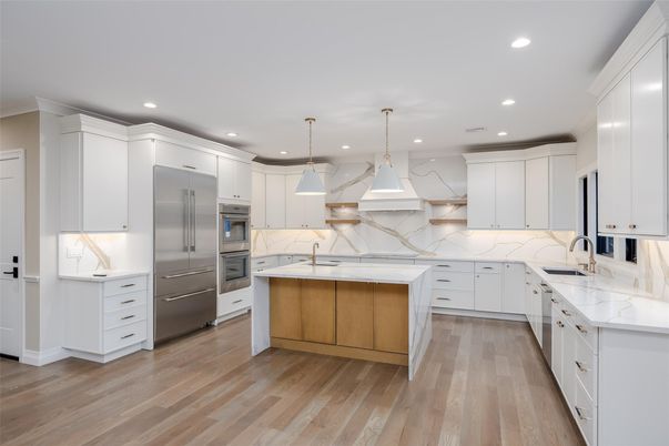 Interior, Kitchen, Marble Walls, Pendant Lights, Recessed Lighting, Stainless Steel Appliances, Wood Texture Flooring
