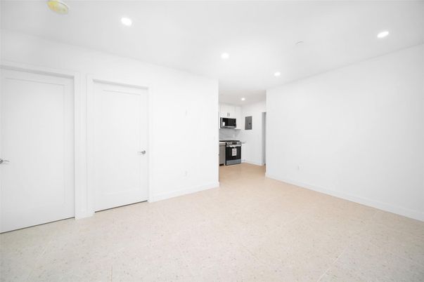 Empty room, Interior, Kitchen, Recessed Lighting, Stainless Steel Appliances