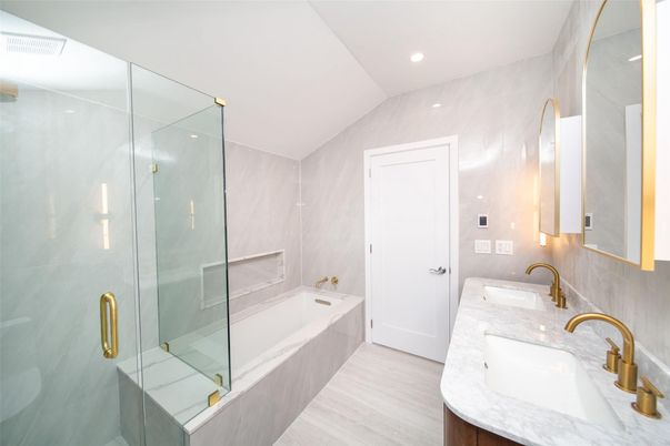 Bathroom, Dual Sink Vanities, Glass Shower, Interior, Recessed Lighting, Wood Texture Flooring