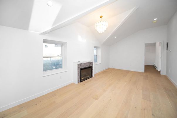 Chandelier, Empty room, Fireplace, Interior, Recessed Lighting, Wood Texture Flooring
