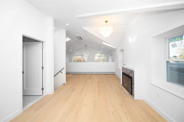 Chandelier, Empty room, Fireplace, Interior, Recessed Lighting, Wood Texture Flooring