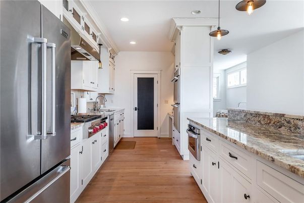 Interior, Kitchen, Pendant Lights, Recessed Lighting, Stainless Steel Appliances, Wood Texture Flooring