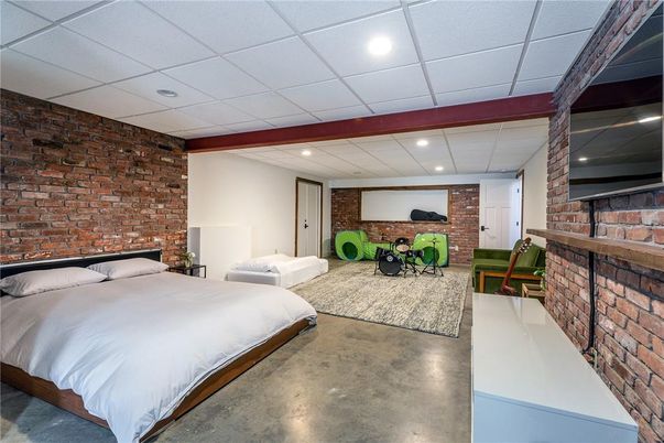 Bedroom, Fireplace, Interior, Recessed Lighting, Stone Walls