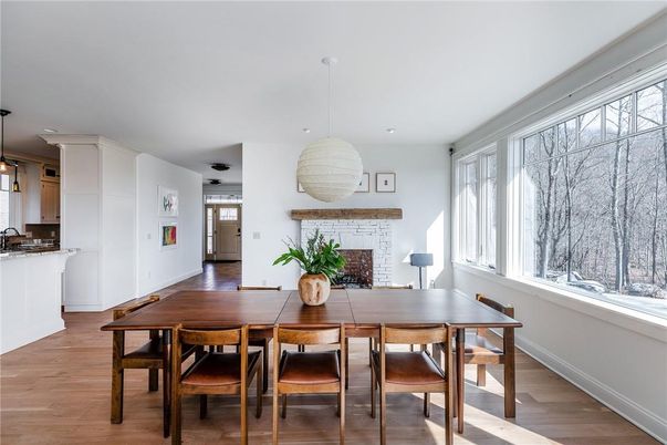 Dining room, Fireplace, Interior, Pendant Lights, Recessed Lighting, Wood Texture Flooring
