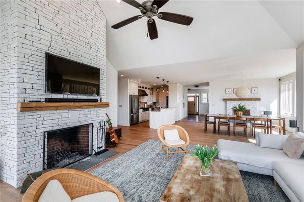 Dining room, Fireplace, Interior, Kitchen, Living room, Pendant Lights, Recessed Lighting, Stainless Steel Appliances, Stone Walls, Wood Texture Flooring