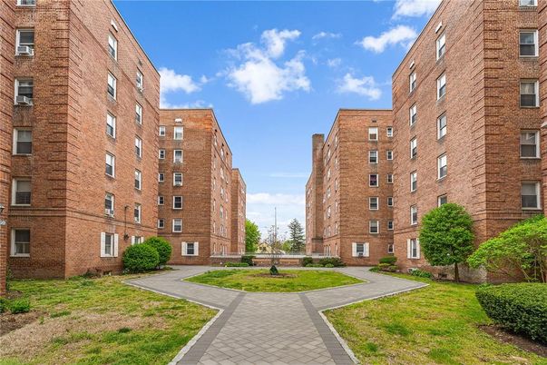 Exterior, Facade, Brick Facade, Condo Building
