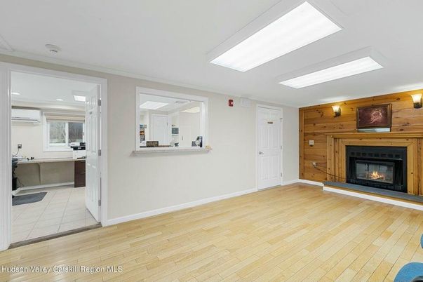 Fireplace, Interior, Recessed Lighting, Wood Texture Flooring, Wooden Walls