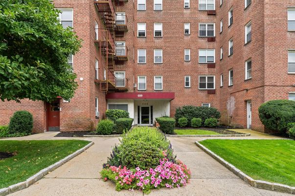 Exterior, Facade, Brick Facade, Condo Building