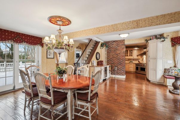 Chandelier, Dining room, Interior, Kitchen, Stainless Steel Appliances, Stone Walls, Wooden Beams, Wood Texture Flooring