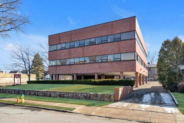 Exterior, Facade, Brick Facade, Condo Building