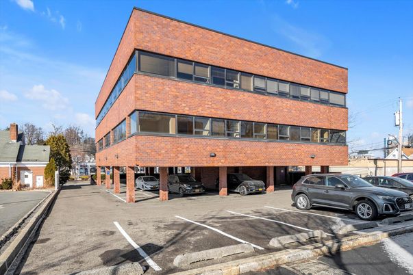 Exterior, Facade, Brick Facade, Condo Building