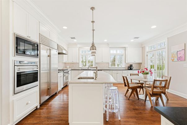 Dining room, Interior, Kitchen, Pendant Lights, Recessed Lighting, Stainless Steel Appliances, Wood Texture Flooring