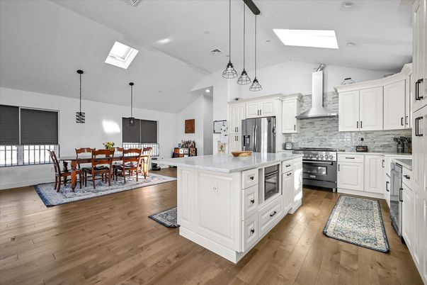 Dining room, Interior, Kitchen, Pendant Lights, Recessed Lighting, Stainless Steel Appliances, Wood Texture Flooring