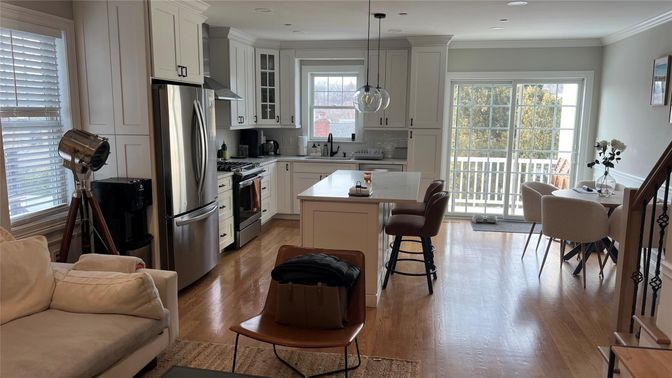 Dining room, Interior, Kitchen, Pendant Lights, Recessed Lighting, Stainless Steel Appliances, Wood Texture Flooring