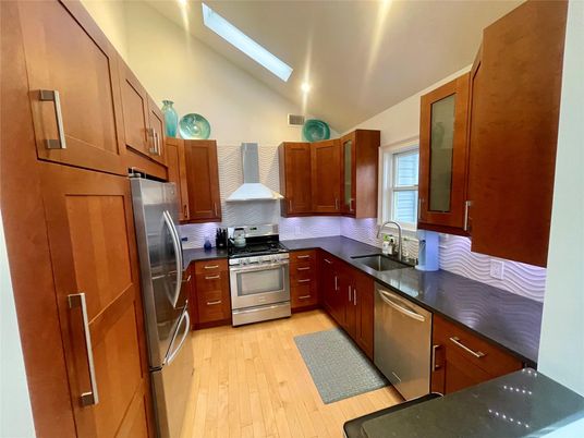 Interior, Kitchen, Recessed Lighting, Stainless Steel Appliances, Wood Texture Flooring