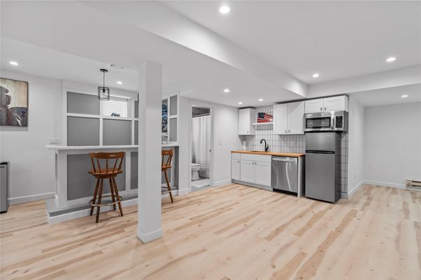 Interior, Kitchen, Pendant Lights, Recessed Lighting, Stainless Steel Appliances, Wood Texture Flooring