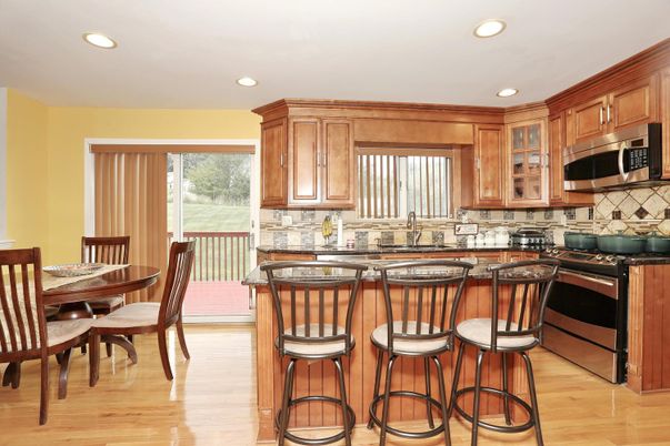 Dining room, Interior, Kitchen, Recessed Lighting, Stainless Steel Appliances, Wood Texture Flooring