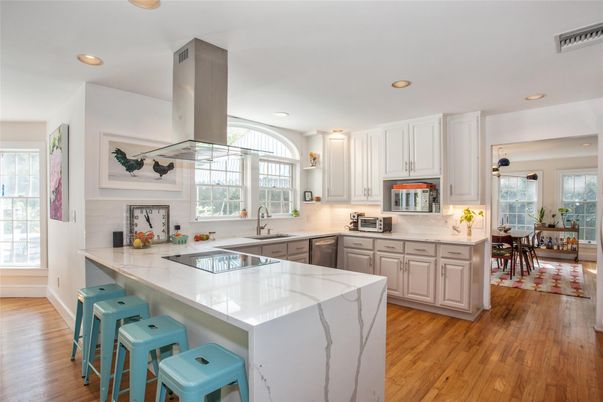 Dining room, Interior, Kitchen, Recessed Lighting, Stainless Steel Appliances, Wood Texture Flooring