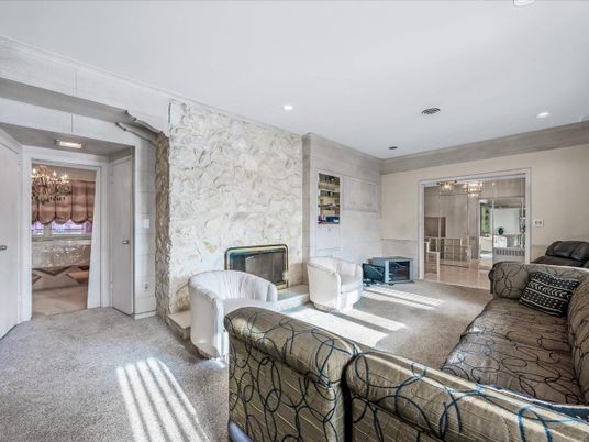 Chandelier, Fireplace, Interior, Living room, Recessed Lighting, Stone Walls
