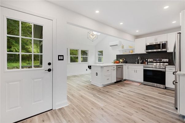 Interior, Kitchen, Recessed Lighting, Stainless Steel Appliances, Wood Texture Flooring