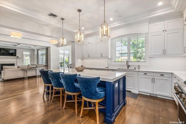 Fireplace, Interior, Kitchen, Living room, Pendant Lights, Recessed Lighting, Stainless Steel Appliances, Wood Texture Flooring