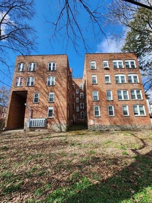 Backyard, Exterior, Facade, Brick Facade, Condo Building