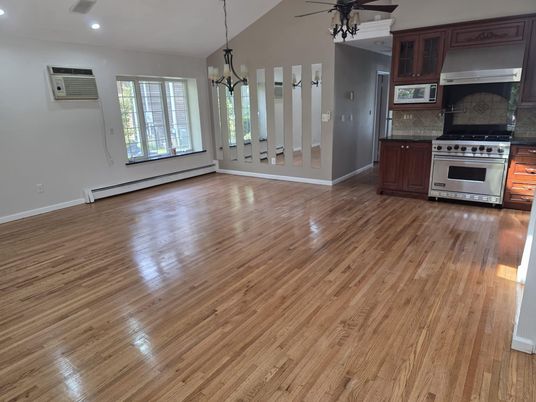 Empty room, Interior, Kitchen, Pendant Lights, Recessed Lighting, Stainless Steel Appliances, Wood Texture Flooring