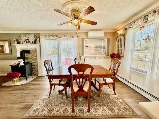 Dining room, Fireplace, Interior, Stone Walls, Wood Texture Flooring